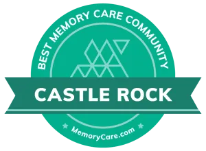 Green badge with geometric design recognizes Castle Rock as "Best Memory Care Community," with MemoryCare.com and Global Footer also mentioned.